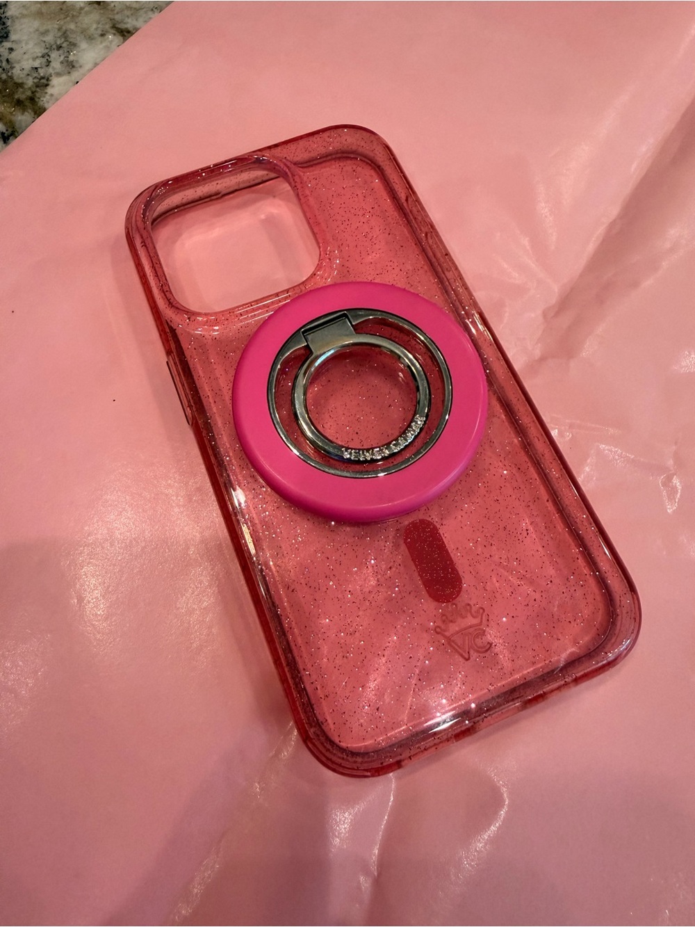 Velvet Caviar Pink Glitter Phone Case with Pink Ring Grip for an iPhone 15 pro